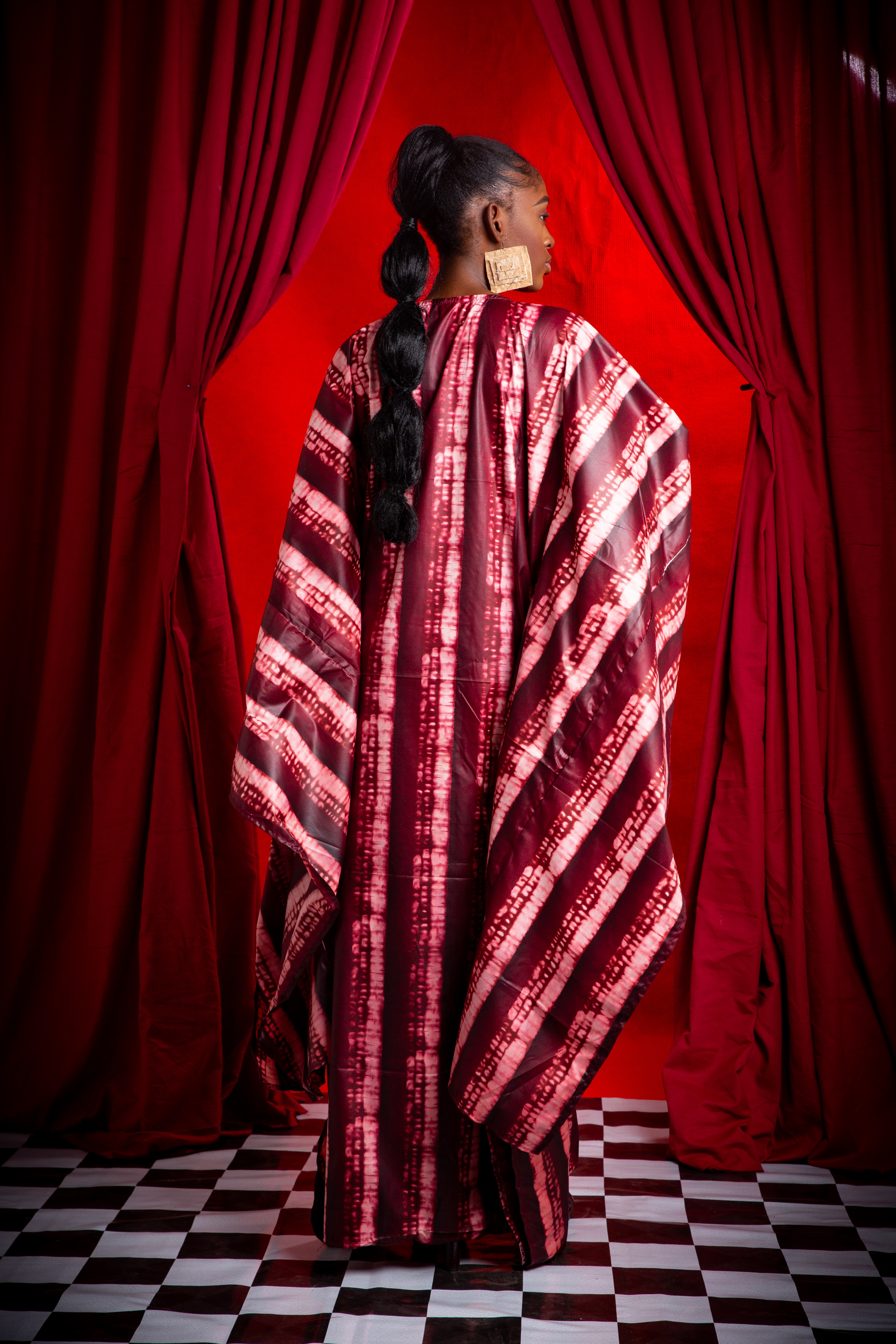 Image 2 of Nden Bobo Burgundy batik dress with raffia decorated neckline (TEGUE)