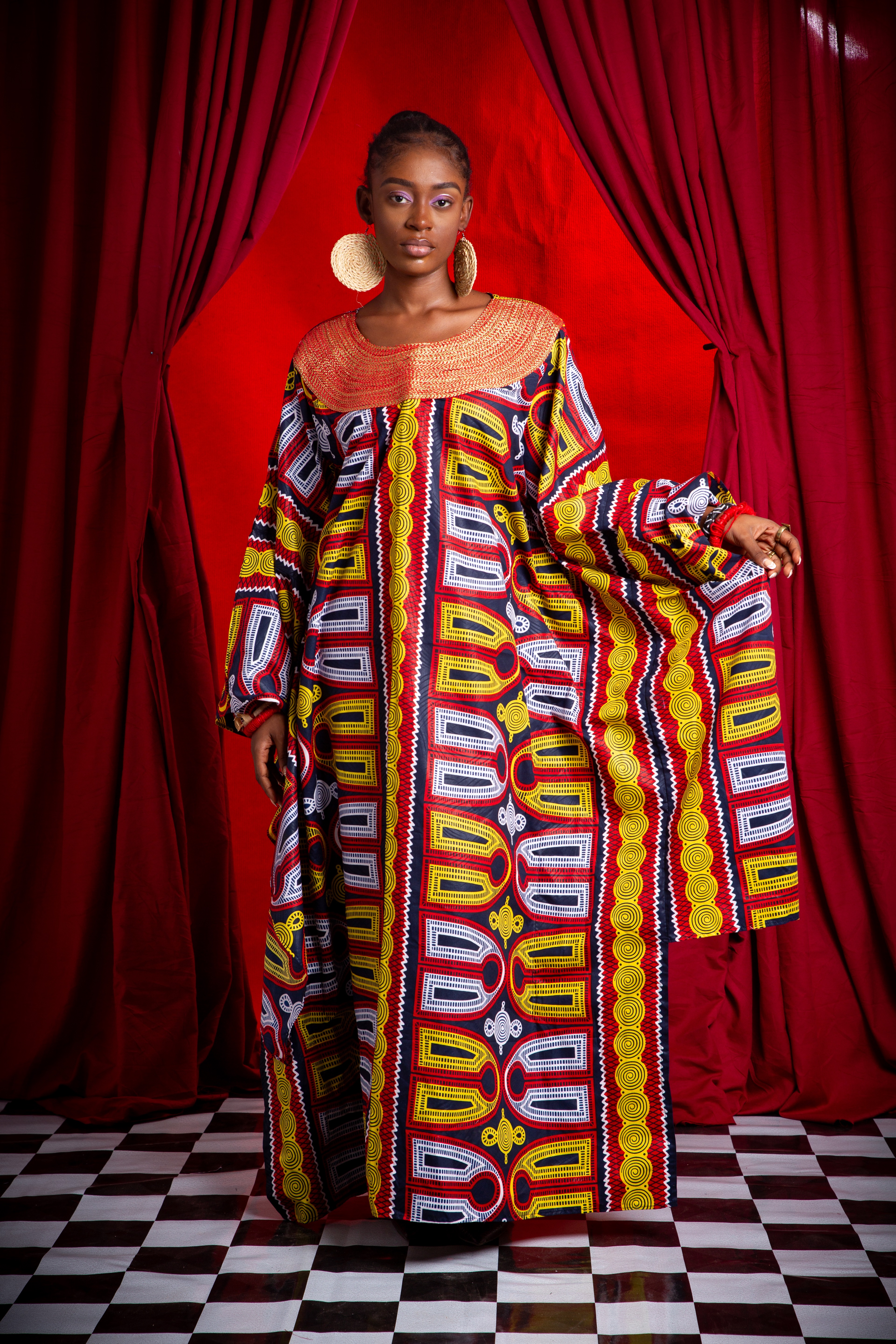 Image 1 of Nden Bobo Red and Yellow Toghu decorated boubou dress (TEGUE)