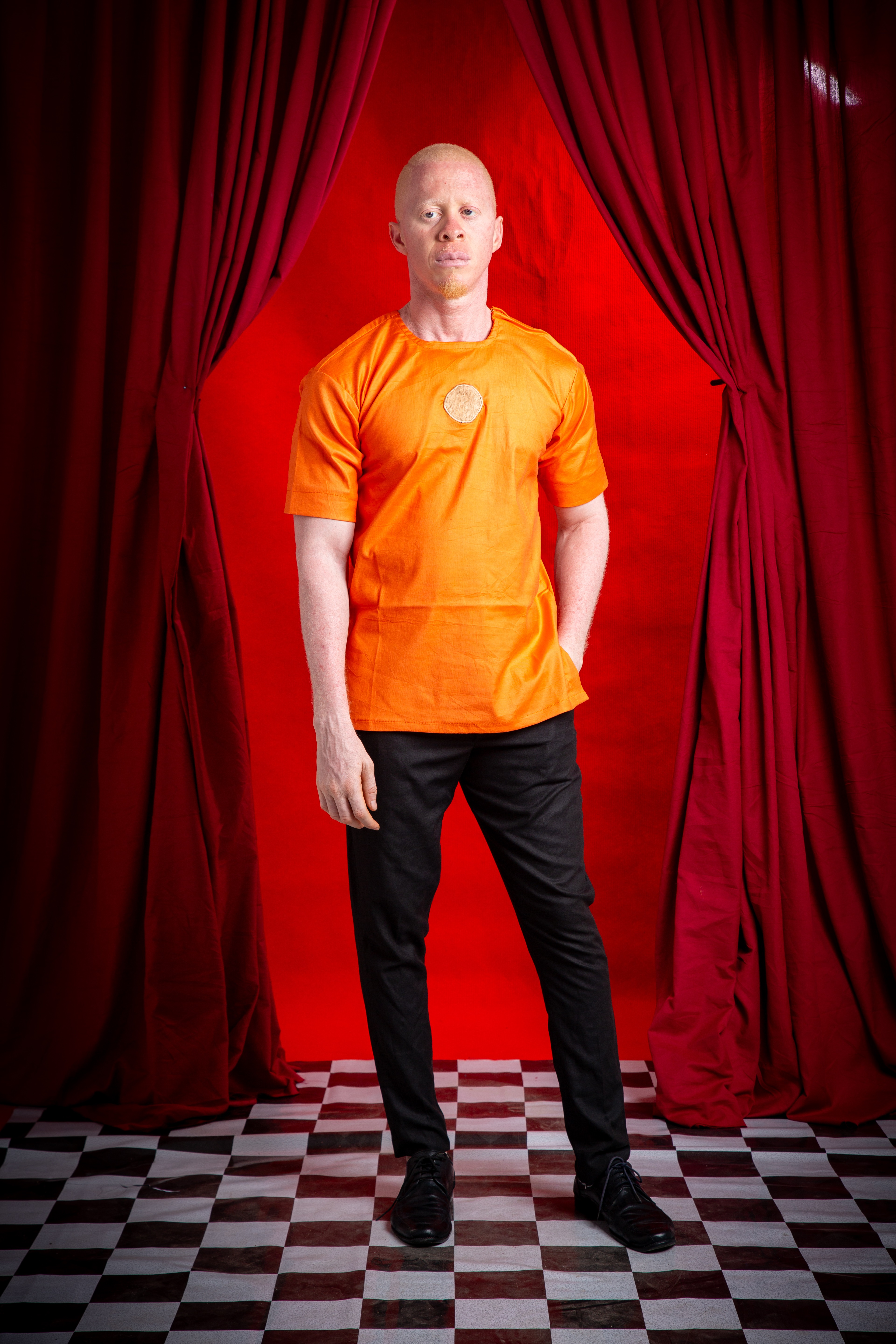 Image 1 of Ela orange cotton shirt with obom decoration (TEGUE)